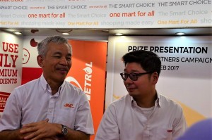 L-R: Tan Kim Thiam with Nicholas Tan, Director, Tan Chong Group.