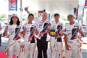 The Malaysian drivers with Peter Thompson.