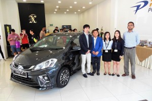 L-R: Perodua Sales Sdn Bhd MD's Office Divisional Executive Coordinator, Mr Naruhiko Kosaka; Perocom Auto Pte Ltd Managing Director, Mr John Ng; Perocom Auto Pte Ltd Executive Sales Director, Ms Cindy Chua; Perocom Auto Pte Ltd Sales Executive, Ms Esther Ng Zhi Yuan; Perodua Sales Sdn Bhd Export Planning and Development Assistant Manager, Tengku Izuddin Tengku Najmuddin.